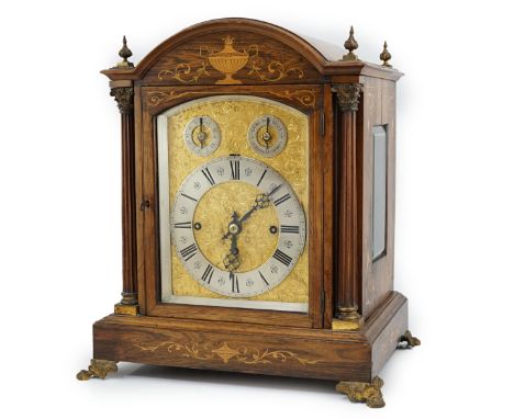 A late Victorian marquetry inlaid rosewood chiming bracket clock in arched architectural case, with scroll engraved gilt bras
