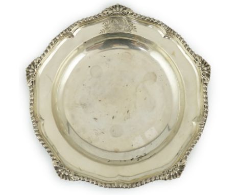 A George III silver soup plate, by Parker &amp; Wakelin, with shell and gadrooned border and engraved armorial, London, 1760,