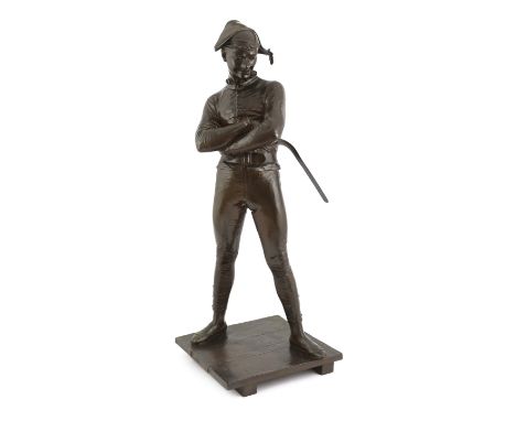 Charles Rene de St Marceaux (French, 1845-1915), a bronze figure of Harlequin standing with arms crossed upon a naturalistic 