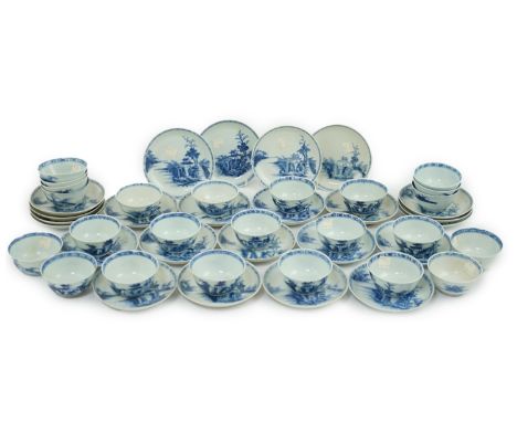 A set of twenty four Chinese Nanking Cargo blue and white ‘large pagoda’ tea bowls and saucers, Qianlong period, saucers 11.9