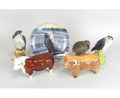 Beswick models of a Highland Bull and a Hereford Bull together with two Royal Doulton Peregrine Whisky decanters, a Poole pot