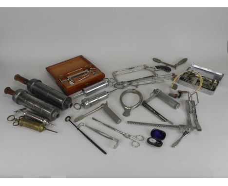 A large collection of medical equipment, early to mid 20th century, including surgical and general practice tools, implements