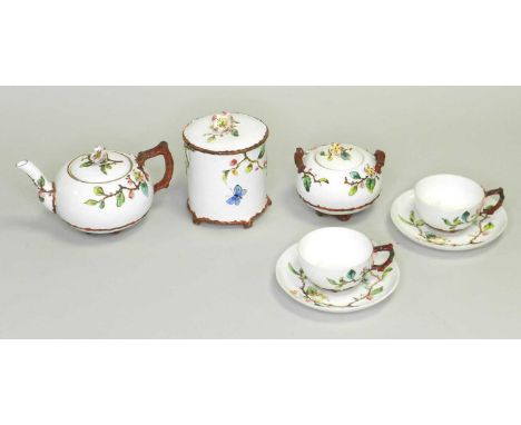 An EJD Bodley 'Blossom' tea servicecirca 1876comprising teapot and cover, twin-handled sugar bowl and cover, two teacups and 