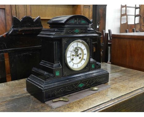 A French black marble mantel clock, circa 1900, the architectural case with malachite inserts and gilt line detail, the ename