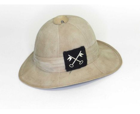 A British pith helmet with a 2nd Infantry Division patch, dated 1942, interior leather liner with markings for Everitt W Vero