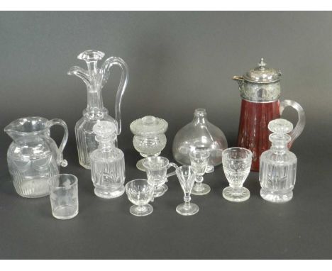 A collection of glassware, predominantly 19th centuryincluding two fly catches, claret jug and stopper, firing glasses, custa