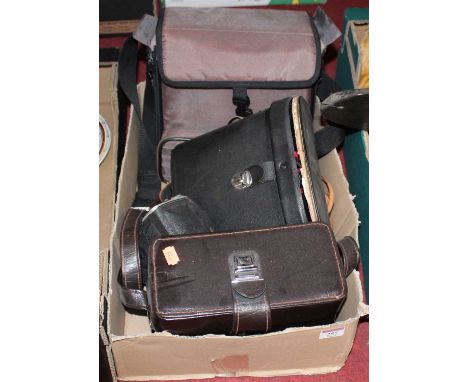 A Praktica BX20 camera; together with a Kodak Duaflex camera; a pair of binoculars etc 