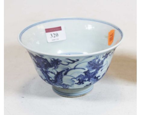 A Chinese export 'Dragon' bowl, underglaze blue decorated with various five-claw dragons, having four character seal mark ver