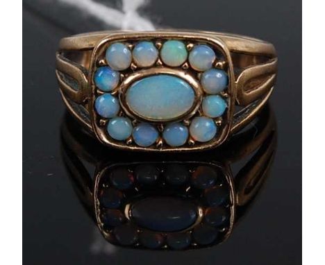 A 9ct gold and opal set tablet ring, 3.6g, size NCondition report: Circa 1970s/80s.Hallmarked 9ct, London, sponsor CJW.No app