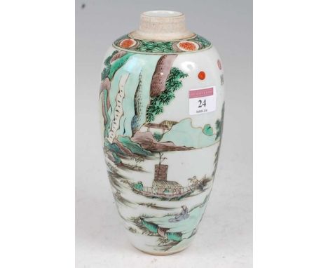 A Chinese Famille Verte vase of slender ovoid form, enamel decorated with various figures within mountain landscape, having r