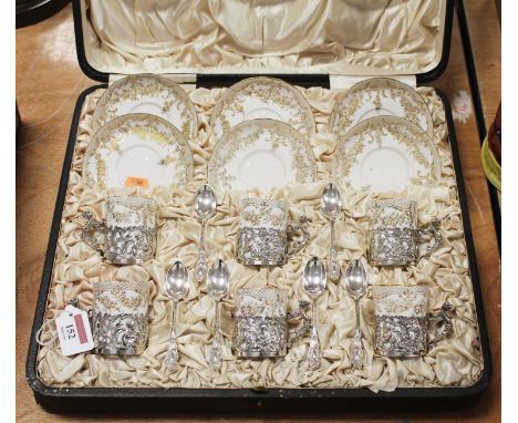 A late Victorian Crown Staffordshire eggshell six-place setting coffee service, on a white ground heightened in gilt, registr