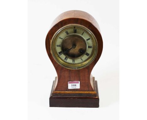 An early 20th century French walnut cased balloon 8-day mantel clock, the enamel chapter ring showing Roman numerals, 25cm hi