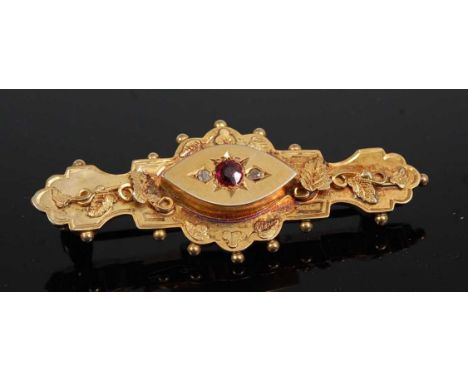 An early 20th century 9ct gold ruby and diamond point set bar brooch, 3.4g, 4.5cm