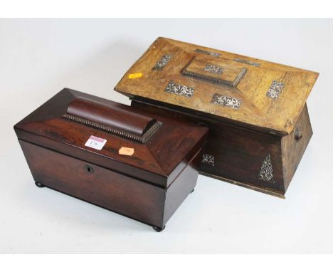 A William IV rosewood tea caddy, of sarcophagus form, the hinged lid revealing a central associated mixing bowl and twin comp