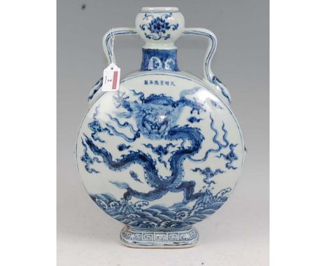 A Chinese export blue &amp; white moon flask of slab sided circular form underglaze blue and white decorated with a five claw