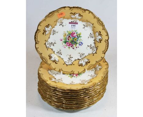 A collection of twelve Victorian dessert plates by Mintons, each having a central floral decoration within peach border and h