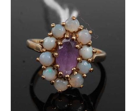 A 9ct gold, amethyst and opal set cluster ring, setting width 17mm, 3.7g, size M