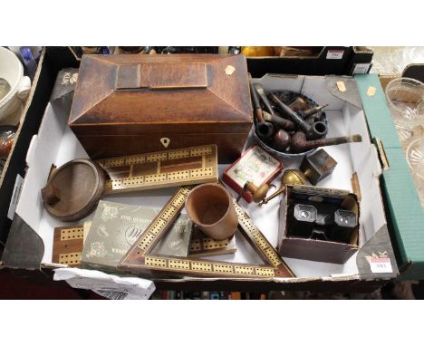 A box containing a collection of various items to include a George III mahogany tea caddy of sarcophagus form, various smokin