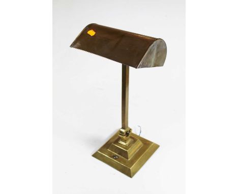 A 1930s American brass adjustable desk lamp, height 44cmCondition report: Adjusts and holds firm.Some minor dents.Would benef