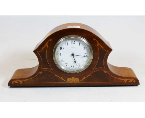 A 1920s mahogany and satinwood inlaid cased mantel clock, having an enamelled dial with Arabic numerals and eight-day movemen