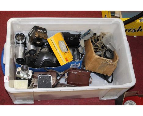 A box of various cameras, lenses, and further accessories to include Olympus exampleCondition report: Olympus camera is a mod