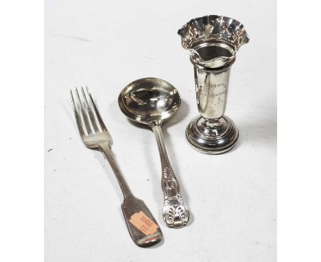 A Victorian silver sauce ladle in the Kings pattern, together with a 19th century silver table fork, and a George VI silver s