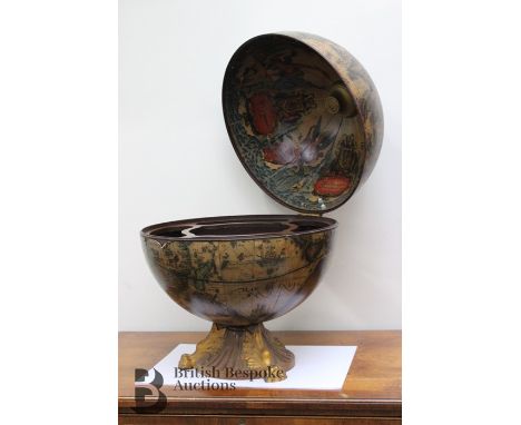 A drinks cabinet in the form of a globe, diameter 42cms, height 54cms.&nbsp;