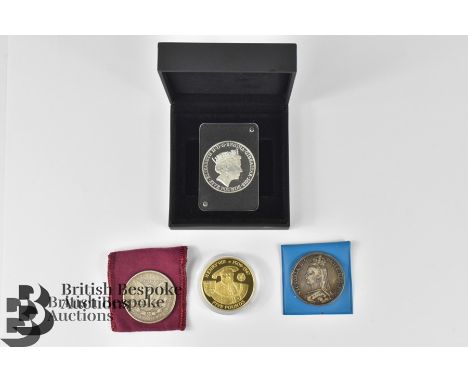 Four silver coins, including 1889 silver Victorian crown, US 1879 US Morgan silver dollar, 15th Anniversary of Operation Chas