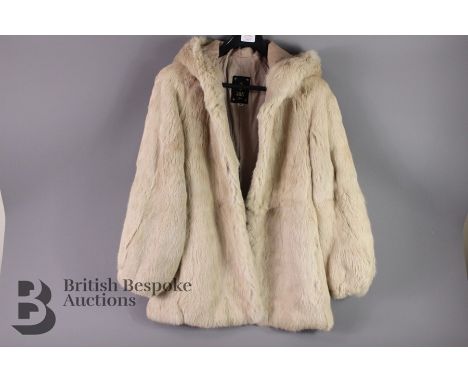 Three vintage fur coats, including a black rabbit short coat size medium, champagne rabbit short coat size medium and one bro