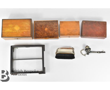 Four small wooden box, one with key, a small decorative pipe, a Mutax dry cleaning brush, and glass bottom tray.
