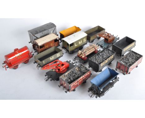 A collection of x15 vintage Hornby and other O gauge tinplate rolling stock wagons to include; Shell Motor Spirit tanker, 10 