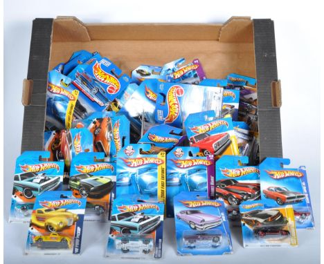 A collection of x40 assorted Mattel made Hot Wheels carded diecast model cars. Examples to include; Ford Mustang Fastback, 19