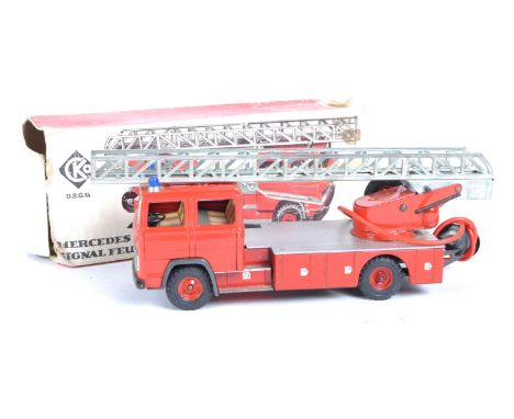 A vintage West German CKO Kellermann made tinplate friction motor Mercedes Fire Engine model. The model with elevating ladder