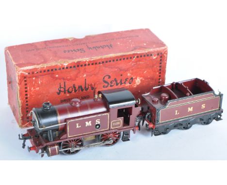 A vintage Hornby O gauge tinplate clockwork model railway trainset locomotive No. 1 Special Tank loco with tender. The loco b