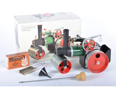 An original vintage Mamod steam model SR1A Steam Roller. The model appearing unused with a clean fuel compartment, funnel, st
