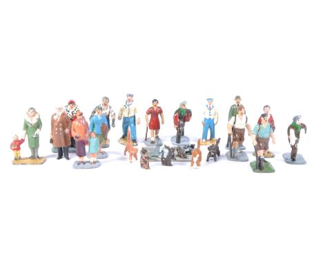 A collection of vintage Hornby Series / Dinky Toys O gauge model railway trackside figures to include; passengers with childr