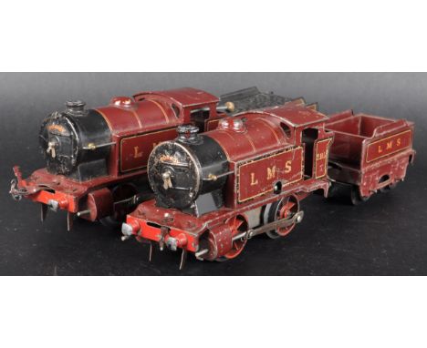 Two vintage Hornby O gauge tinplate clockwork model railway trainset locomotive engines. Both examples being LMS 0-4-0 No. 21