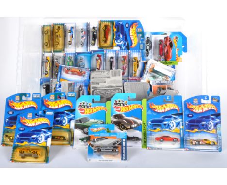 A collection of x40 assorted Mattel made Hot Wheels carded diecast model cars. Examples to include; Porsche 911 GT1-98, Aston