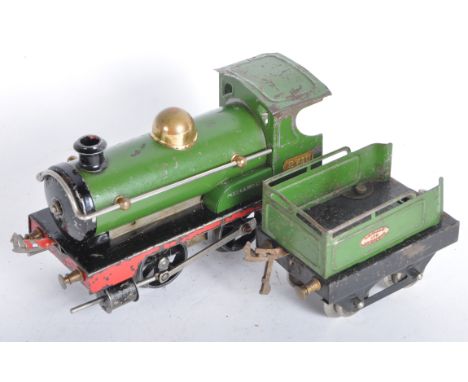 A vintage Hornby O gauge tinplate clockwork model railway trainset locomotive engine. The loco being an early Meccano&nbsp;Lt