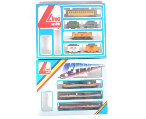 Two vintage Lima 00 gauge model railway locomotive trainsets comprising; 103406T with Stewards Lane Intercity loco with x2 ca