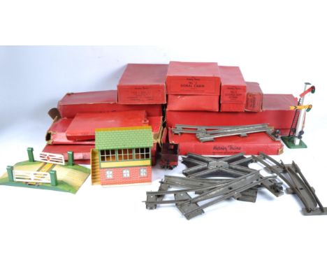 A collection of assorted vintage Hornby Series O gauge tinplate clockwork model railway trainset accessories to include; Doub
