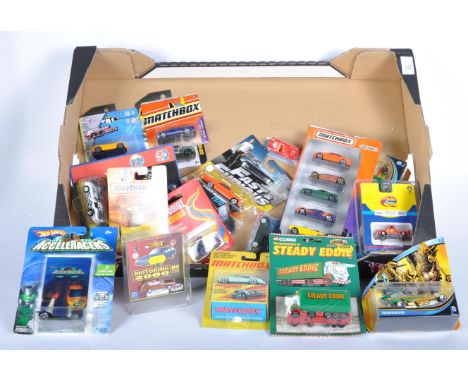 A collection of assorted carded diecast model cars by various makers comprising; Mattel Matchbox and Hot Wheels, Maisto, Corg