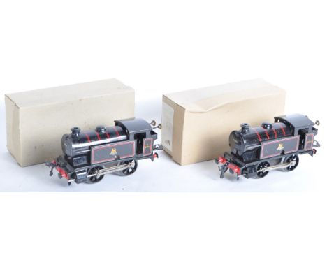 Two vintage Hornby O gauge tinplate clockwork model railway trainset locomotives. Both examples being 0-4-0 Type 40 Tank loco