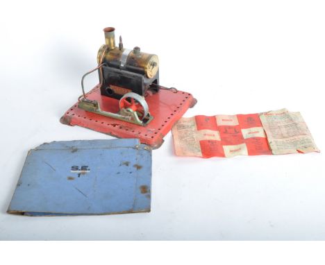 A vintage 1950s Mamod live steam model No. SE1 Superheated Stationary Steam Engine. The model with cylindrical boiler, spoked