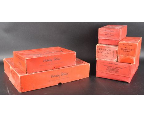 A collection of assorted boxed vintage O gauge tinplate model railway trainset trackside accessories to include; Double Arm S