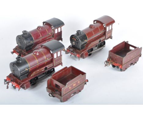 Three vintage Hornby O gauge tinplate clockwork model railway trainset locomotives comprising x2 Type 501 LMS 5600 and x1 E50