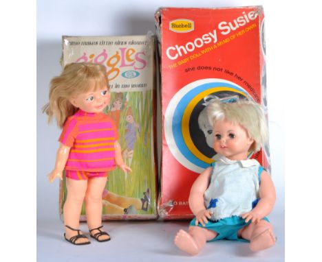 An original vintage 1960s (1967) Ideal Toy made ' Giggles ' doll along with a Bluebell ' Choosy Susie '. The Giggles doll wit