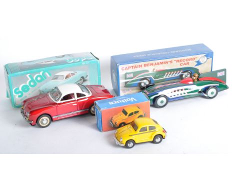 A collection of x3 original vintage tinplate clockwork and friction motor cars comprising a ' New Toy ' friction motor Sedan 