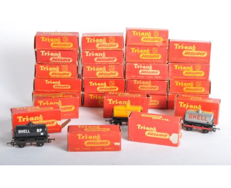 A collection of x25 vintage Triang / Tri-ang 00 gauge model railway trainset locomotive rolling stock wagons and accessories.