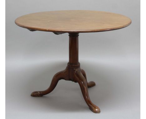 GEORGE III MAHOGANY TILT TOP BREAKFAST TABLE, the circular top on a turned column and tripod base with pad feet, height 72cm,